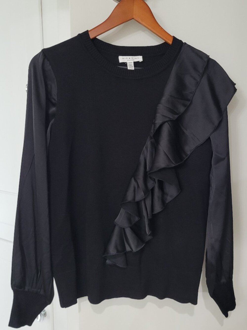 Elegant Black Ruffle Top. Long Sleeves. New. Size M.